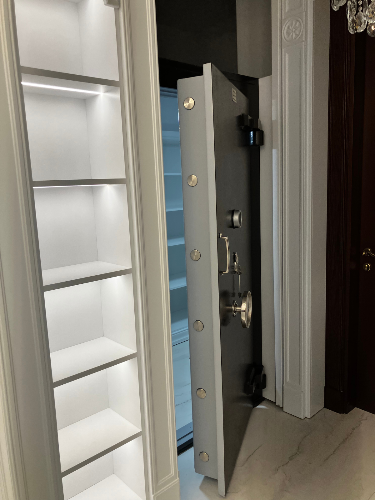 Private estate fortified safe room, concealed entry, custom hardwood shelving, Hashim Engineering Jordan, view 3